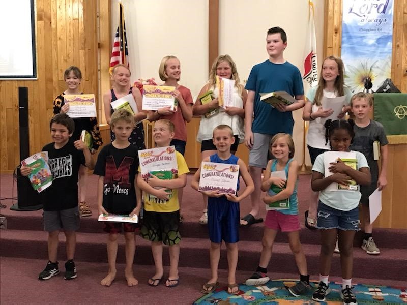 VBS Group of kids holding certificates